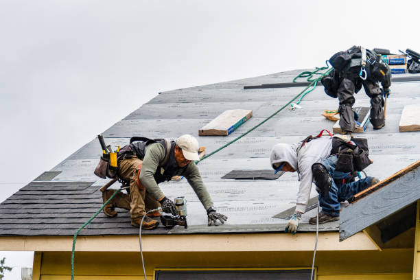 Professional Roofing technician working in Klamath River, CA
